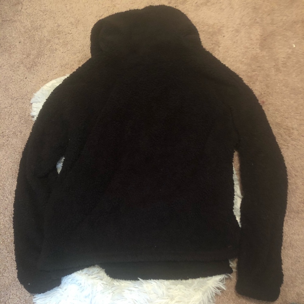 So black sweater